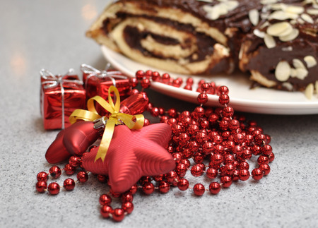 Christmas cake with the decorations and  the giftsの写真素材