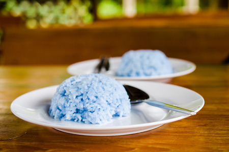 rice cook with the butterfly pea flowerの写真素材