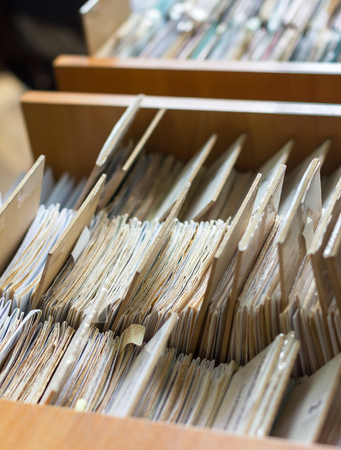 File folders in a file cabinet, card catalog in a library, closeupの写真素材