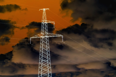 The energy transfer system With the sky and beautiful clouds on bright days. Power poles and power...