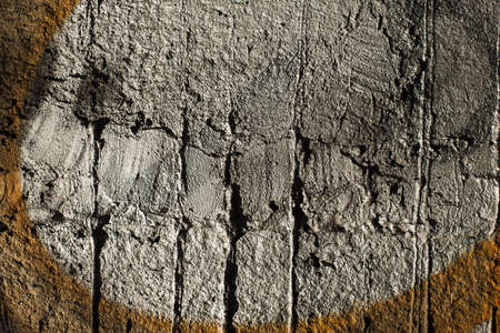 city wall with peeled paint as texture. For backgrounds and textures
