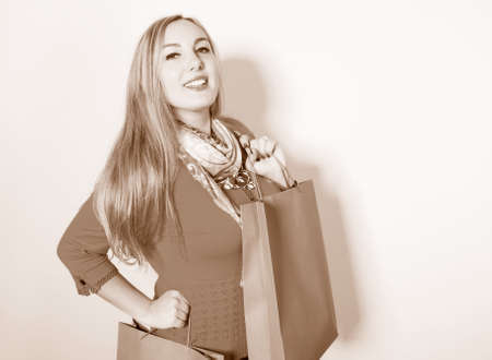 funny beautiful girl doing shopping, enjoying with shopping bags holding in hands