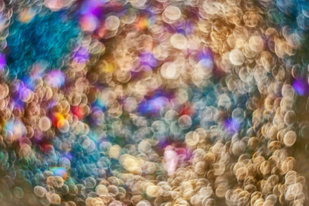 beautiful bokeh, bright blurred background of spark, sparkles, sparkling dust, blur, for background and designの写真素材