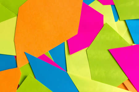 Colorful bright paper texture. Geometrical composition. background of colored paper. Pink, green, blue, yellow. Flat layの写真素材