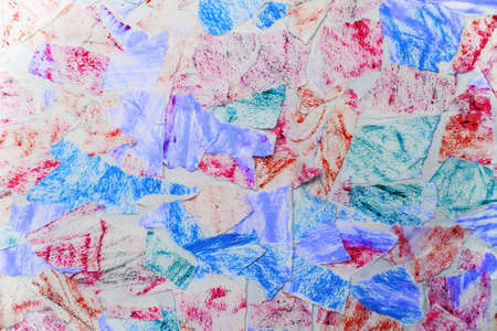 Texture torn into fragments of the picture. Shreds of torn colored paper. Puzzles Abstract backgroundの写真素材