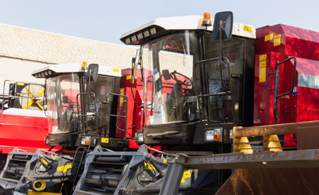 Tractors and cab harvesters. Agricultural machinery at the assembly plant.
