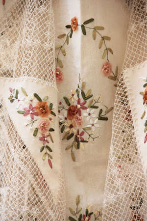fabric with embroidered ribbons for background and texture