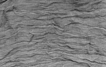 Pleated fabric background texture. pattern of fabric in the crease pattern for backgrounds and...