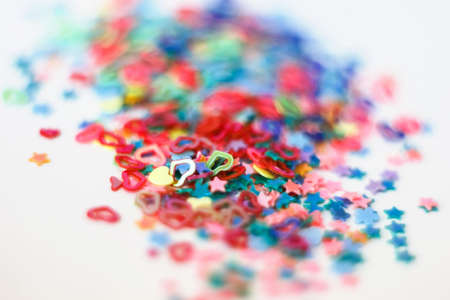 Christmas background, colorful candy on a white background, shallow depth of field