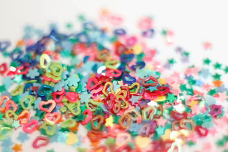 Christmas background, colorful candy on a white background, shallow depth of fieldの写真素材