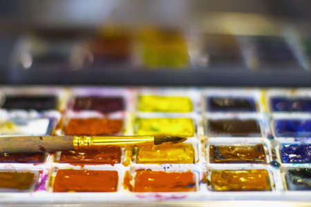 watercolor paint set watercolor paints and brushes for painting. Selective focus.の写真素材