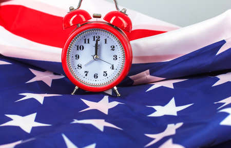 Flag of America and the clock, while America kotseptsiyaの写真素材