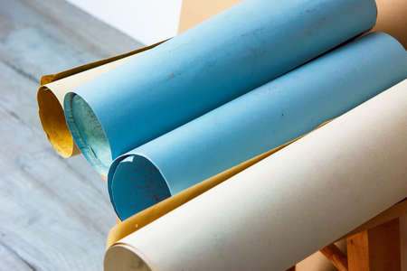 rolled into rolls of paper drawing paper, and outline sketches drawingの写真素材