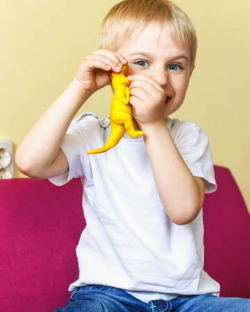 boy with juice in hands, very soft focusの写真素材