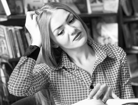girl student for books, doing homework, preparing for exams, to go to college