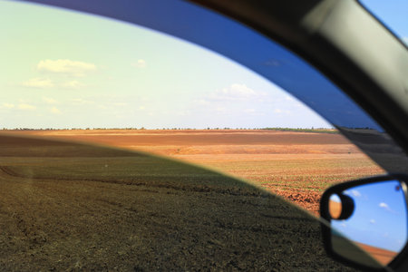 View from the car window on the rural landscape.の写真素材