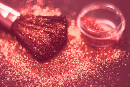 texture of gold glitter on the makeup brush and design. We have a black background. Selective Focus - Pictureの写真素材