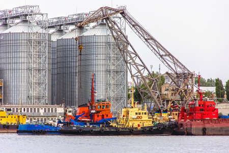 Elevating complex for transshipment of grain and oilseeds as part of a reloading terminal. Transportation of agricultural products.の写真素材