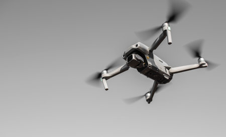 Ukraine, Nikolaev - November 21, 2021 Drone with a quadrocopter with a camera flying in the air. Drone Air 2S.のeditorial素材