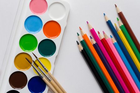 paints, brushes and pencils on the paperの写真素材