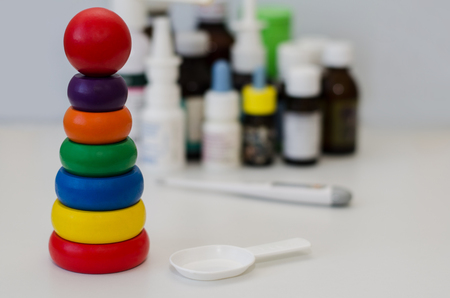 medicine bottles for children and a thermometerの写真素材