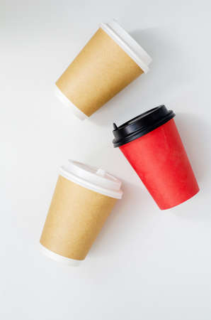 paper cups for coffee lie on the table. waste recyclingの写真素材