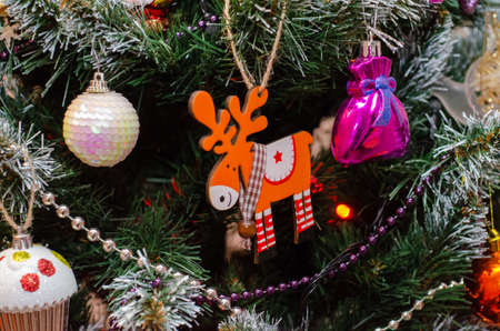 christmas tree close-up with christmas decorations, background with shallow depth of fieldの写真素材