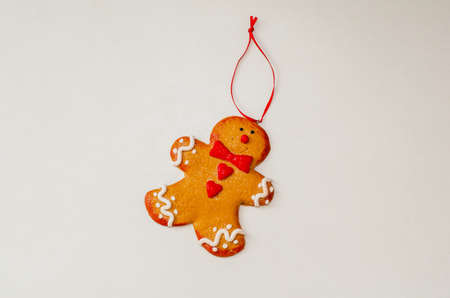 toy christmas gingerbread on the tree on whitw background