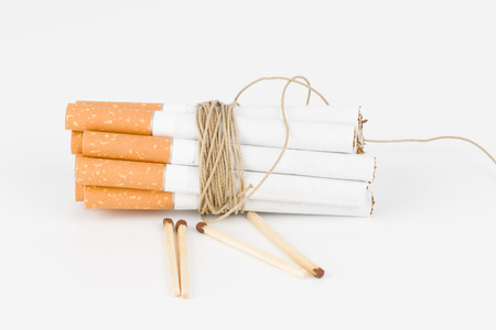 Tied Cigarettes with matchesの写真素材