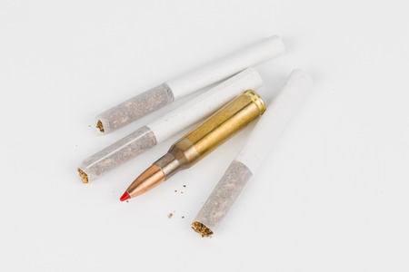Cigarettes and bullets の写真素材