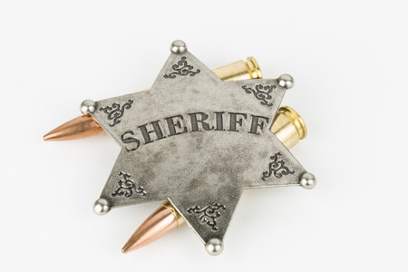 Silver Sheriff star and bullets の写真素材