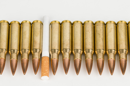 Cigarette with bulletsの写真素材