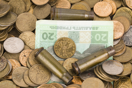 Russian and Ukrainian paper money, bullets  and coins 