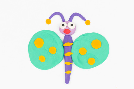 Butterfly  from children bright plasticine - Stock Image macro の写真素材