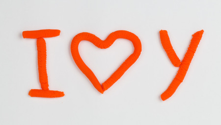 Heart from children bright plasticine の写真素材