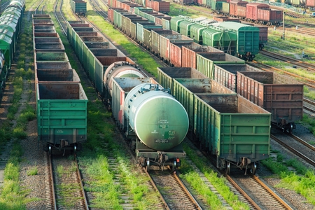 Bataysk, Russia - July 30, 2015: Bataysk railway station. Big railway cargo and passengers station junction with lot of trains and track lines.のeditorial素材