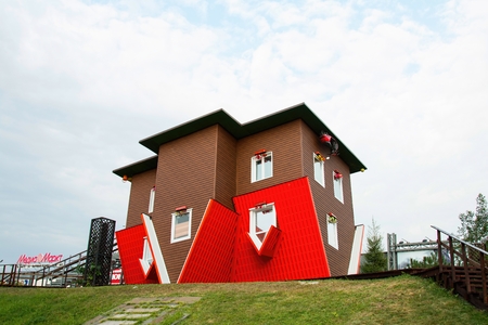 Russia - August 13, 2015: Attraction Upside Down House in the Russian Exhibition Center.のeditorial素材