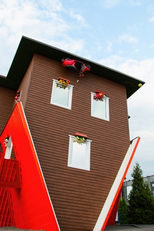 Russia - August 13, 2015: Attraction Upside Down House in the Russian Exhibition Center.のeditorial素材