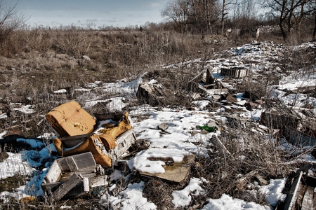 Old armchair on dump. Garbage and wastes. Stock image.の写真素材