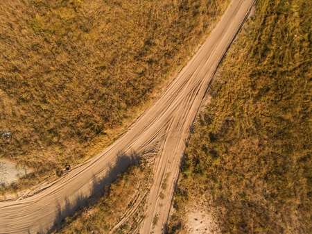 Aerial view of village road and harvest fields. Stock Image.の写真素材
