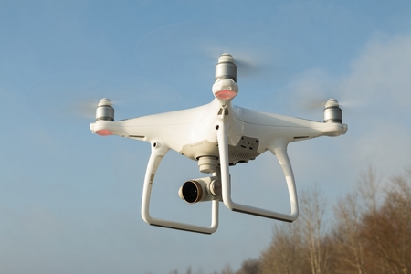 Rostov - on - Don, Russia - January 04, 2017: Flying drone quadcopter Dji Phantom 4 with high resolution digital camera.のeditorial素材