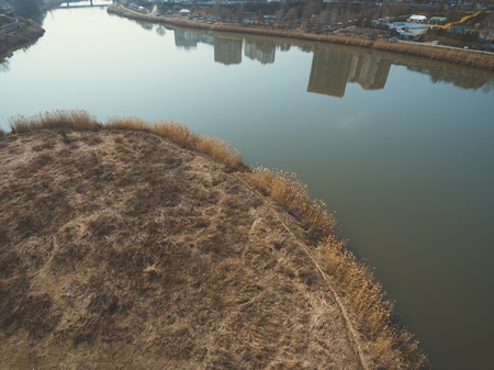 Autumn park. Pond in the autumn park. Aerial view.の写真素材