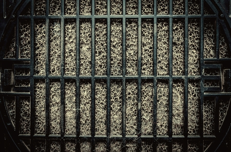 Detailed fragment of dirty air filter surface. Background texture.の写真素材