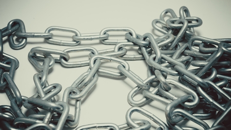 Steel chain heap - abstract metal background. Macro shot.の写真素材