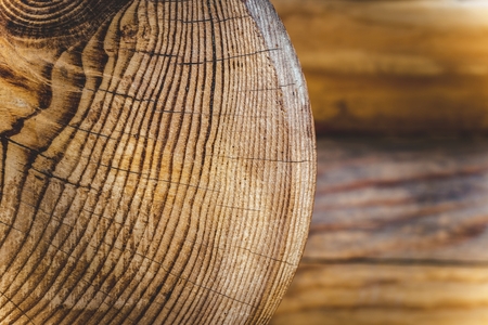 Wall of the rural house made from wooden logs. Wooden background.の写真素材