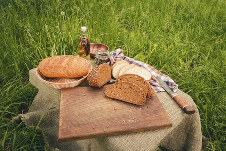 Fresh bread on a cutting board. Natural healthy food concept.
