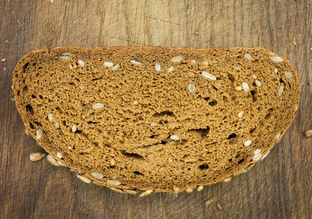 Fresh bread on a cutting board. Natural healthy food concept.