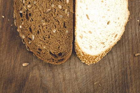 Fresh bread on a cutting board. Natural healthy food concept.