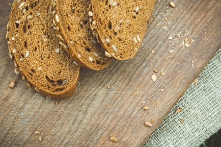 Fresh bread on a cutting board. Natural healthy food concept.の写真素材