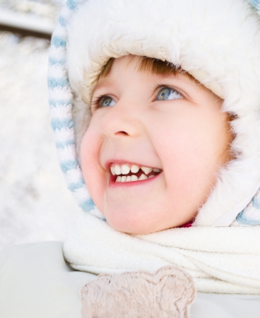 Winter portrait of a cute little girlの写真素材
